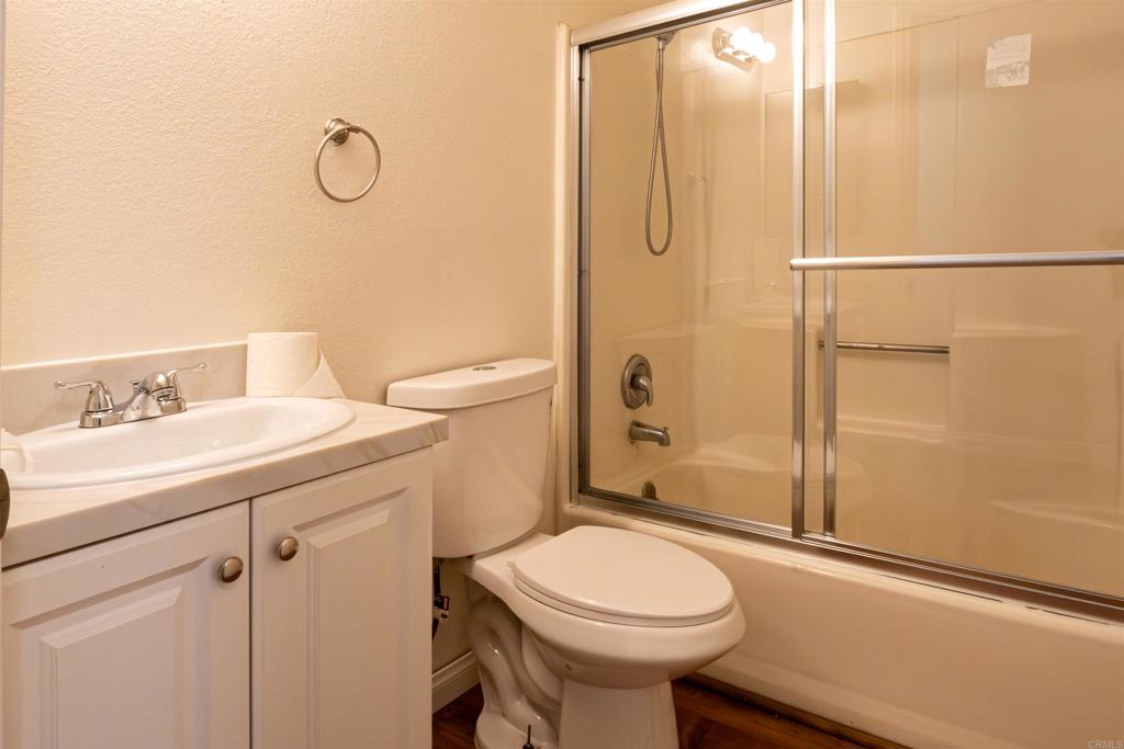 2319 Ridgeway Drive National City, CA 91950 - Photo 5 of 26 a bathroom with a sink a toilet and shower
