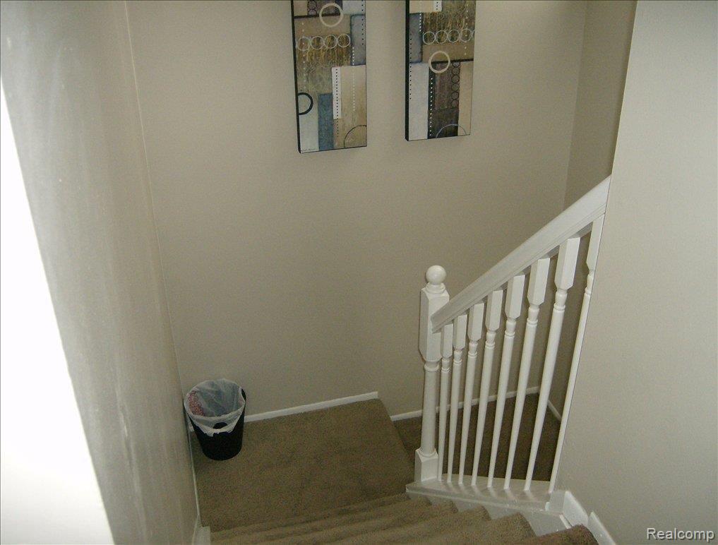 44575 Savery Drive, Unit 86 Canton, MI 48187 - Photo 9 of 16 Stairway to 2nd flr