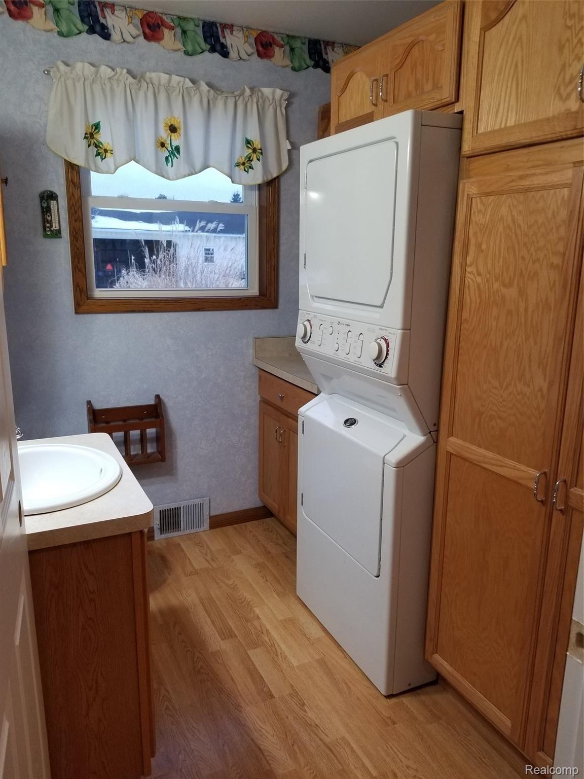 3960 West Coon Lake Road Howell, MI 48843 - Photo 7 of 40 First Floor Laundry and Lav