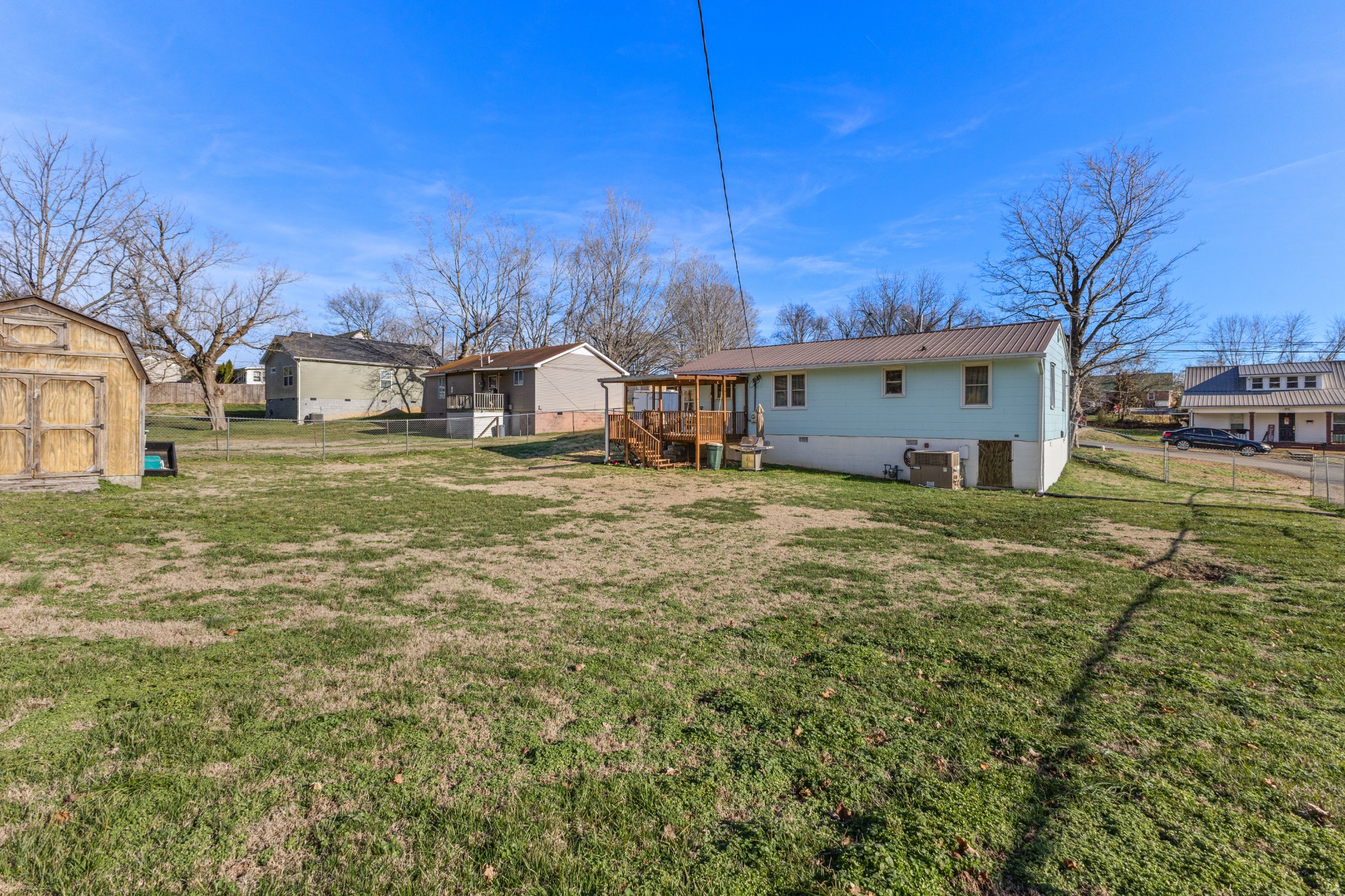 406 High Street Dickson, TN 37055 - Photo 15 of 24 a view of a house with a yard