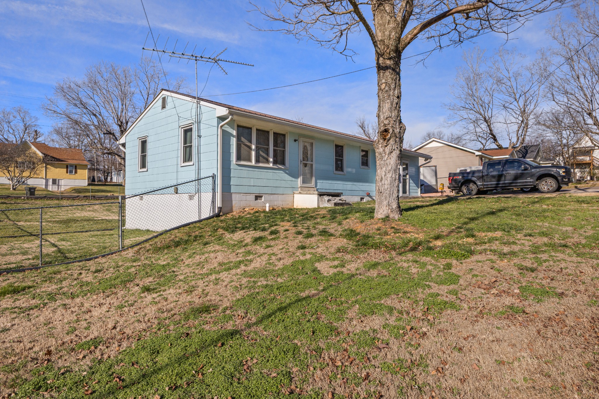 406 High Street Dickson, TN 37055 - Photo 2 of 24 a view of a house with a yard