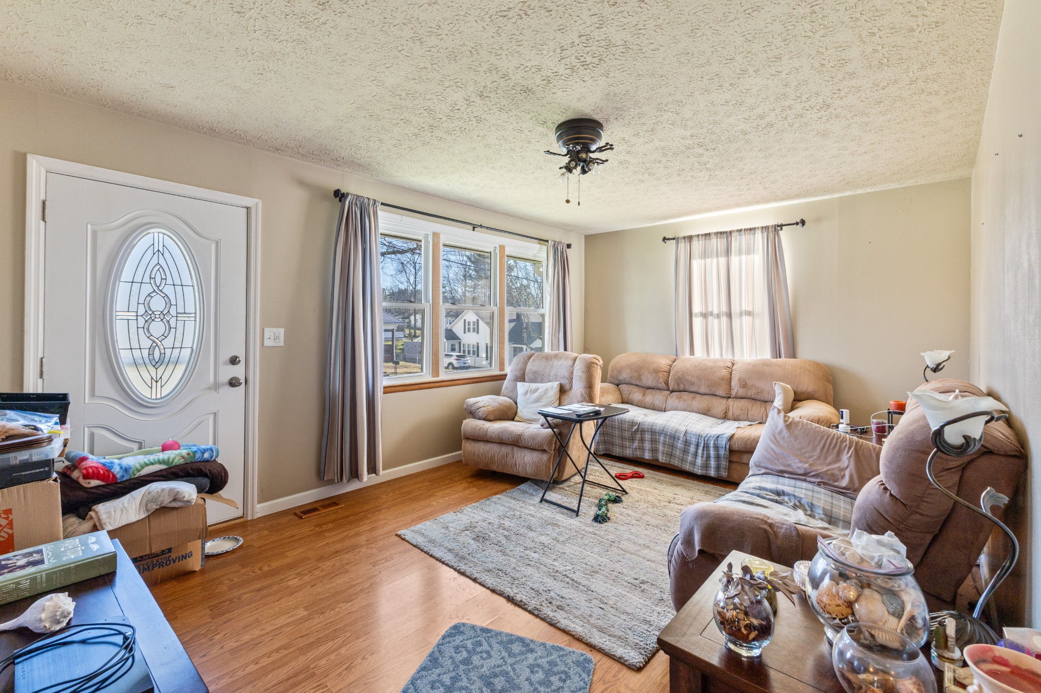 406 High Street Dickson, TN 37055 - Photo 7 of 24 a living room with furniture and a large window