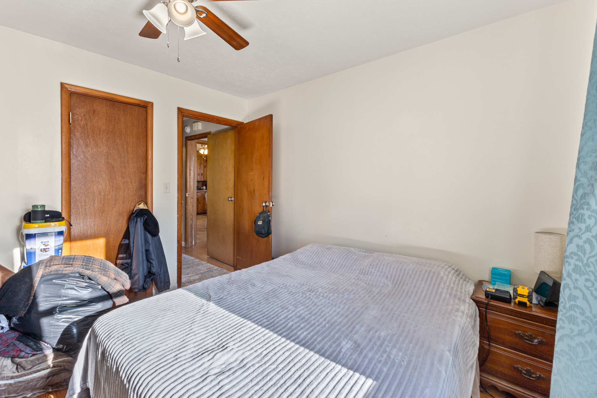 406 High Street Dickson, TN 37055 - Photo 9 of 24 a bedroom with a bed and a dresser