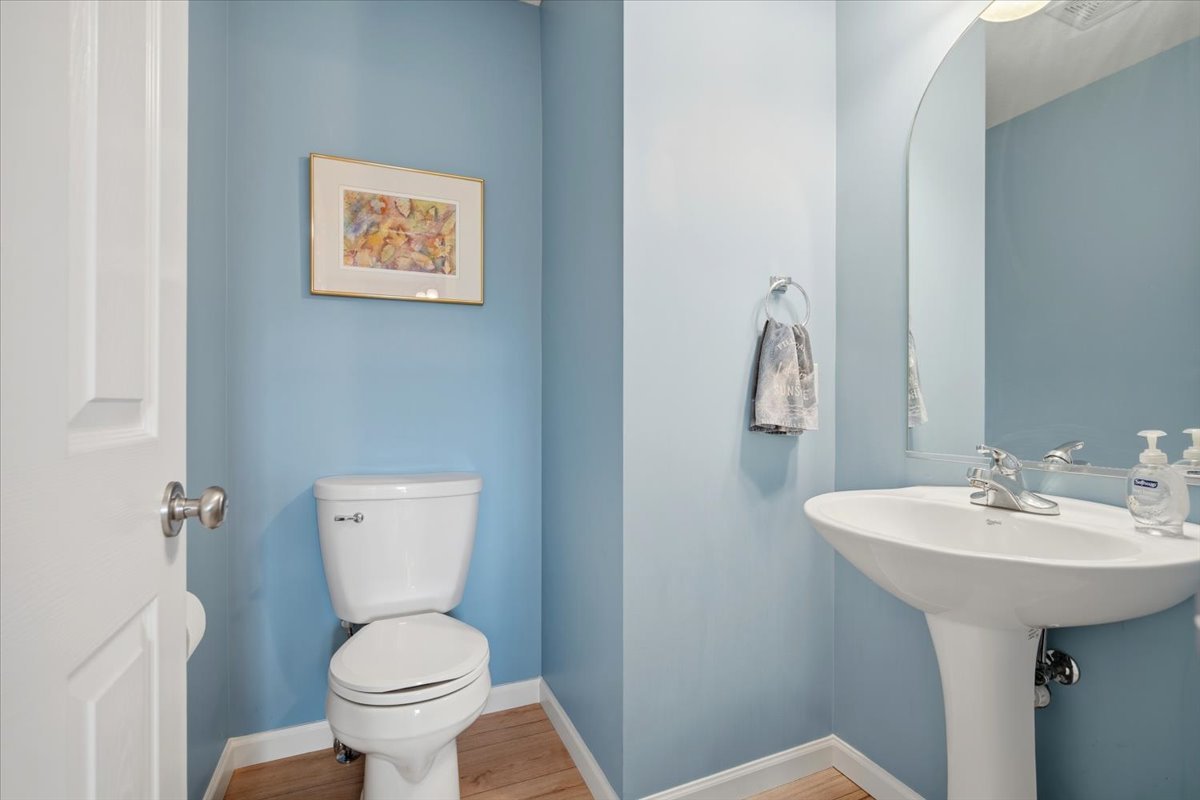 2429 Grey Fox Trail Bloomington, IL 61705 - Photo 14 of 43 a bathroom with a toilet sink and mirror