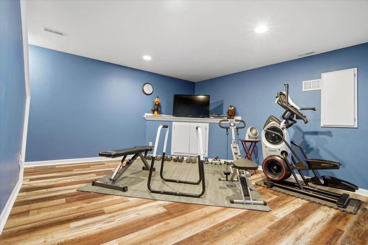 2429 Grey Fox Trail Bloomington, IL 61705 - Photo 28 of 43 a view of a room with gym equipment