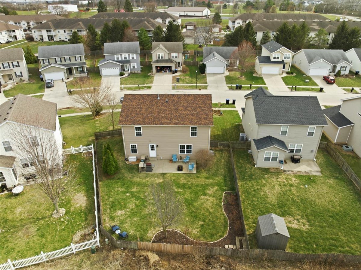 2429 Grey Fox Trail Bloomington, IL 61705 - Photo 34 of 43 an aerial view of residential houses with outdoor space and parking
