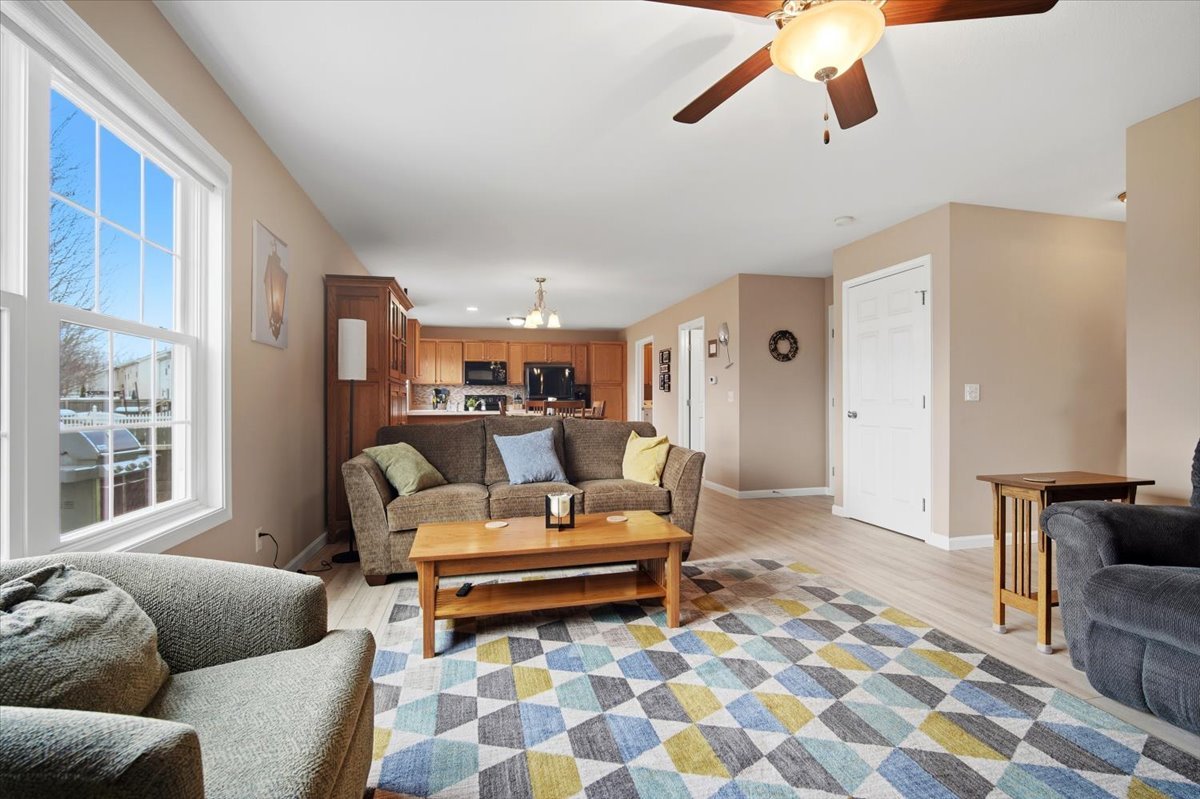 2429 Grey Fox Trail Bloomington, IL 61705 - Photo 5 of 43 a living room with furniture and a rug