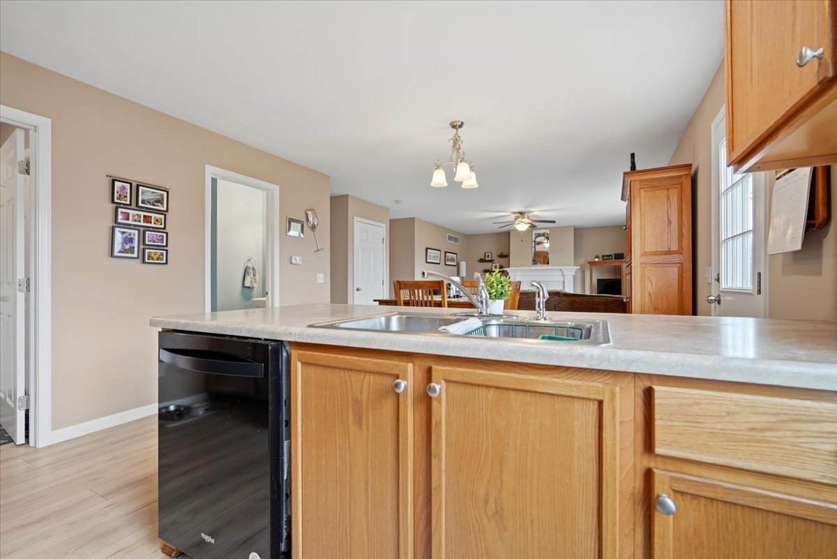 2429 Grey Fox Trail Bloomington, IL 61705 - Photo 10 of 43 a kitchen with stainless steel appliances granite countertop a sink and cabinets