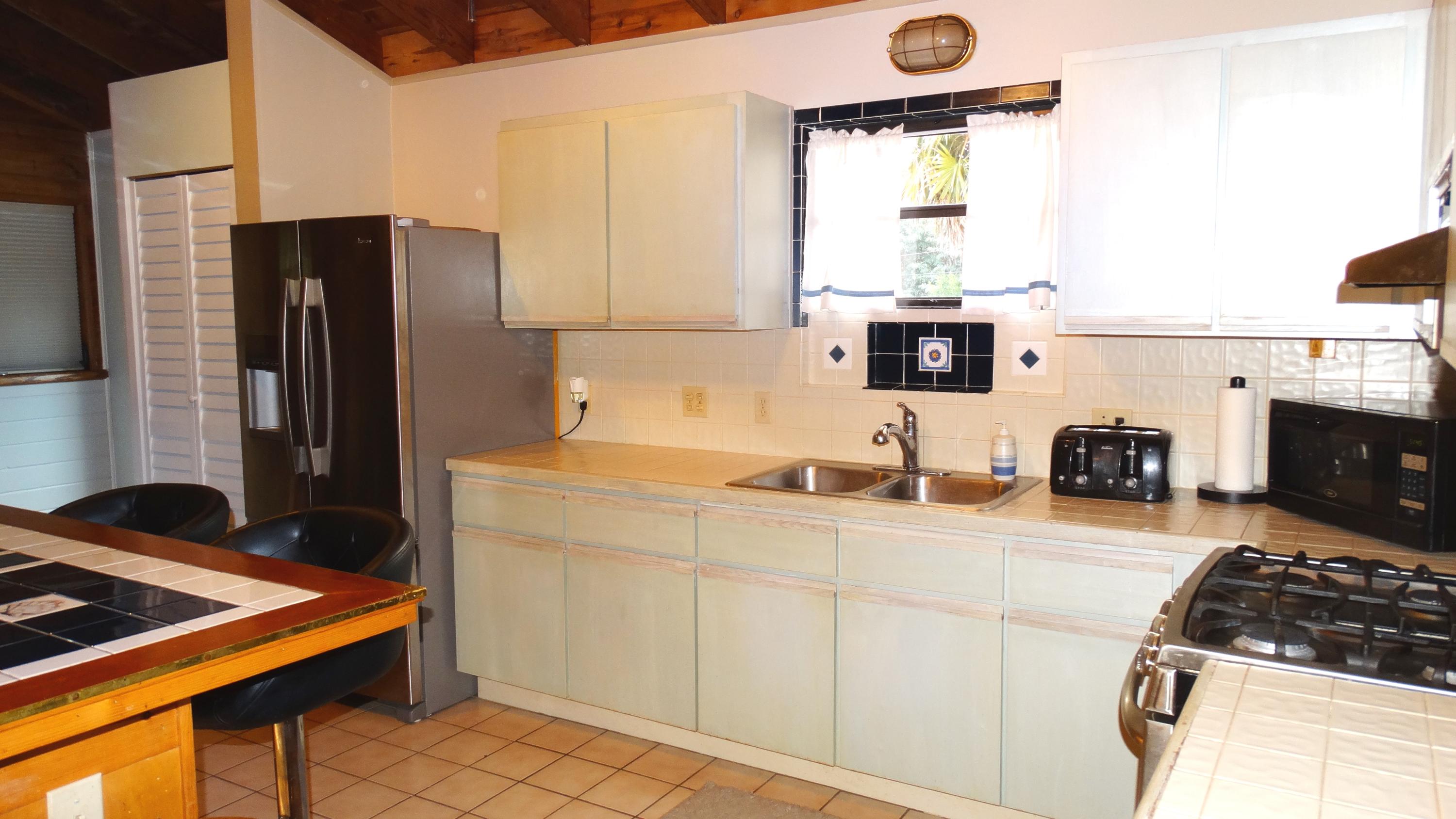 3823 George Road Big Pine Key, FL 33043 - Photo 13 of 38 Kitchen with cabinets and pantry