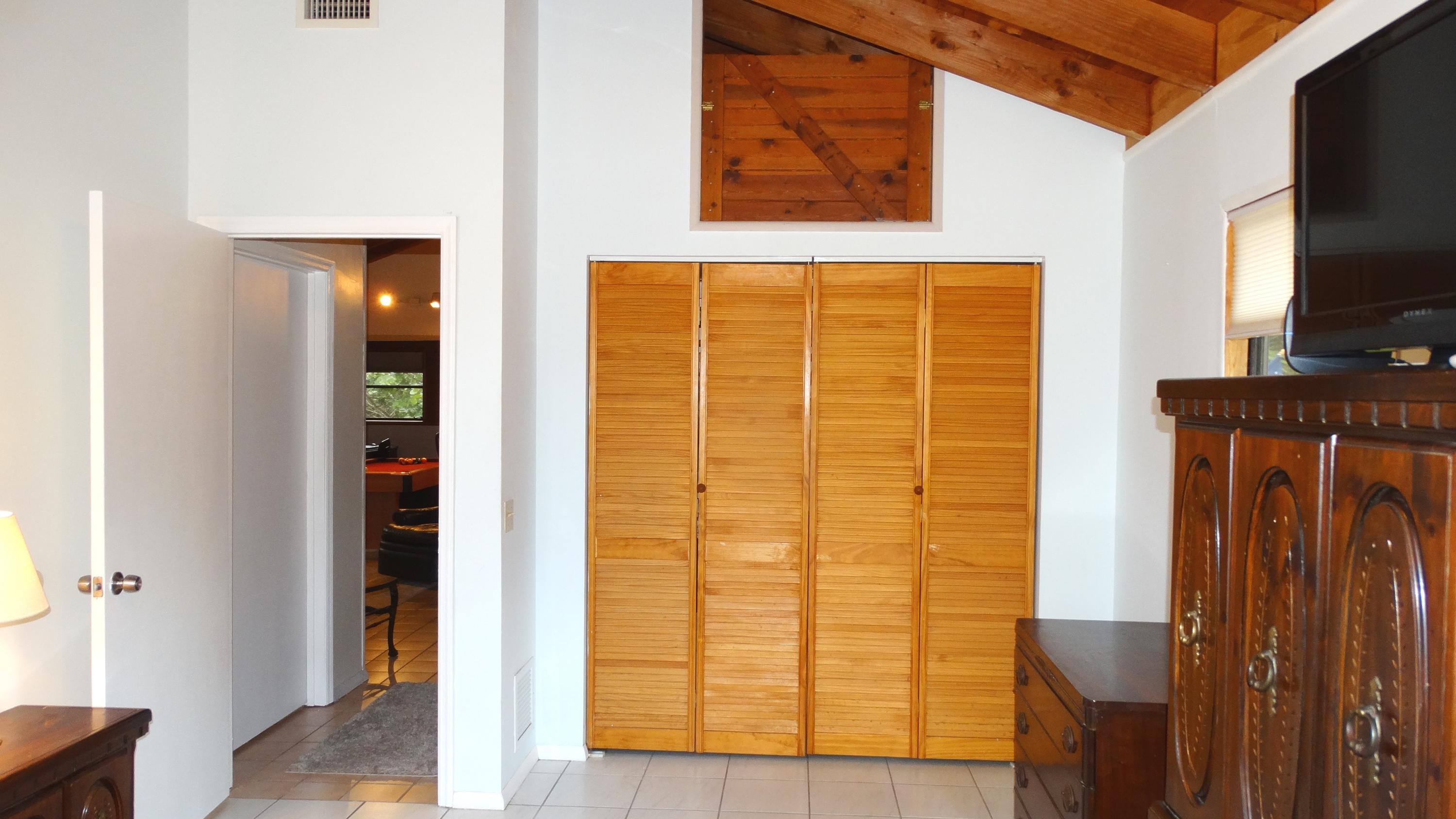 3823 George Road Big Pine Key, FL 33043 - Photo 22 of 38 Closet and storage in guest bedroom