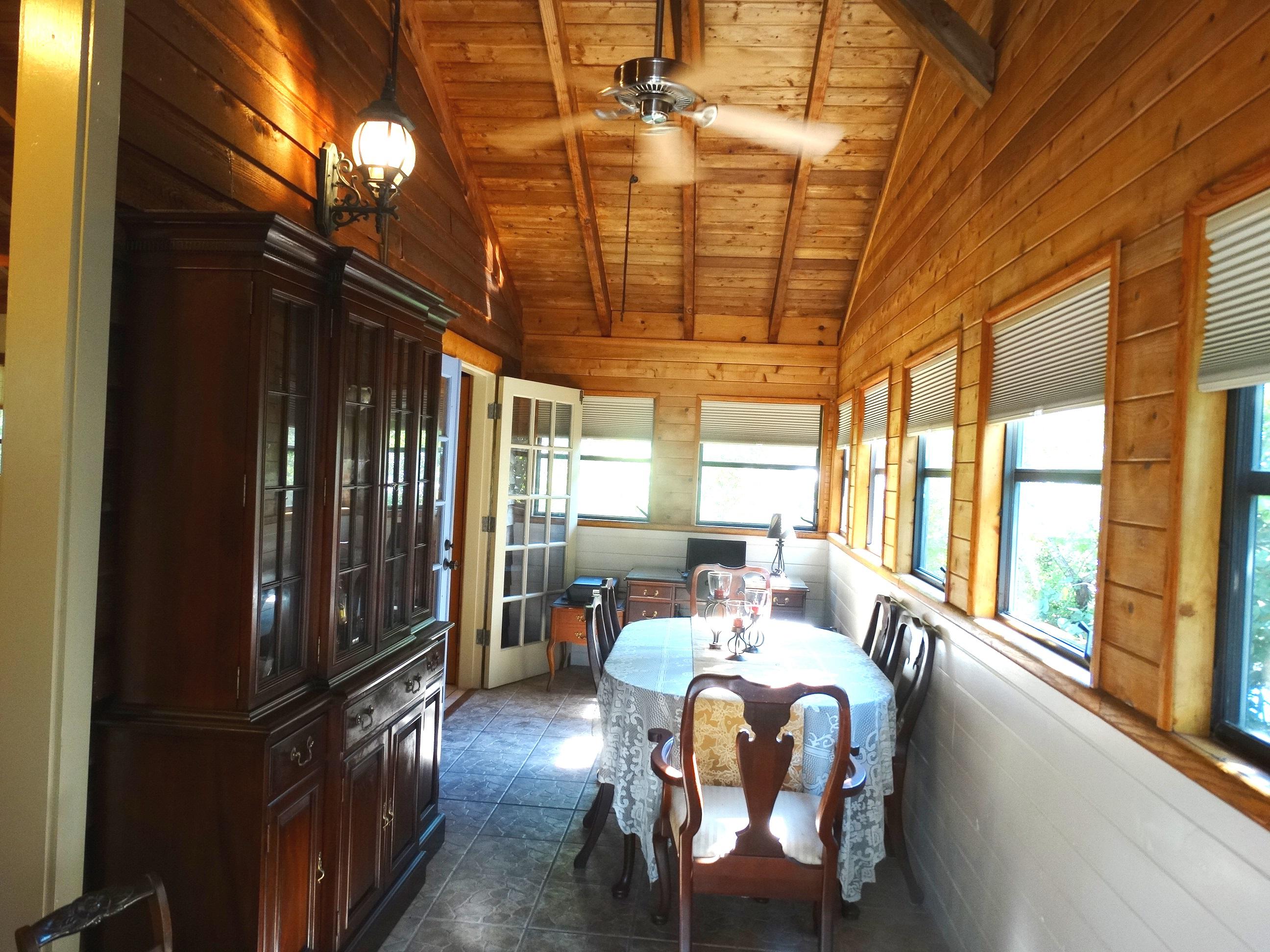 Dining room with lots of windows