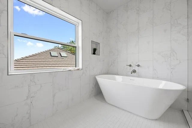 a view of balcony with wooden floor and fence
