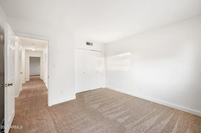 an empty room with a natural light