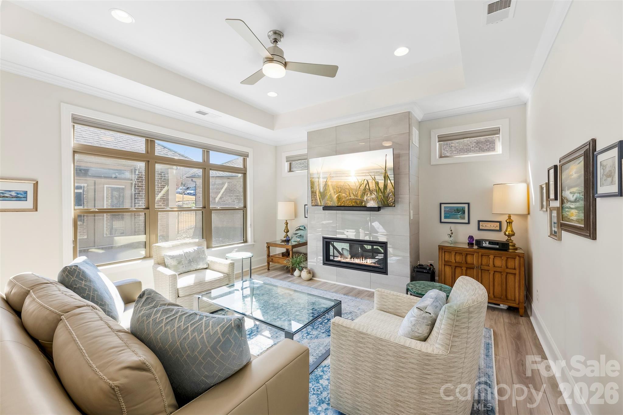 2014 New Style Way Fort Mill, SC 29708 - Photo 13 of 43 a living room with fireplace furniture and a flat screen tv