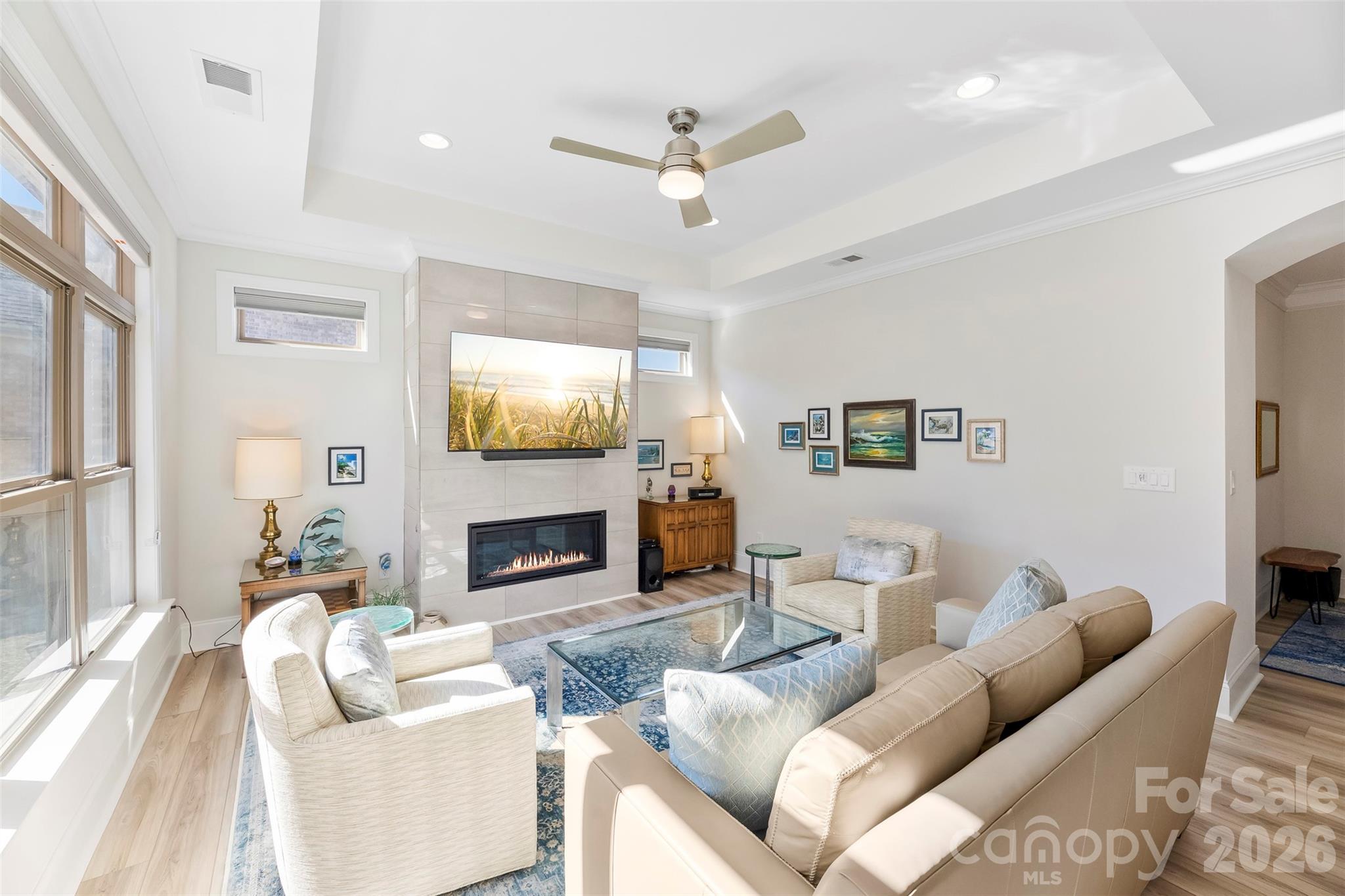 2014 New Style Way Fort Mill, SC 29708 - Photo 15 of 43 a living room with furniture a fireplace and a large window