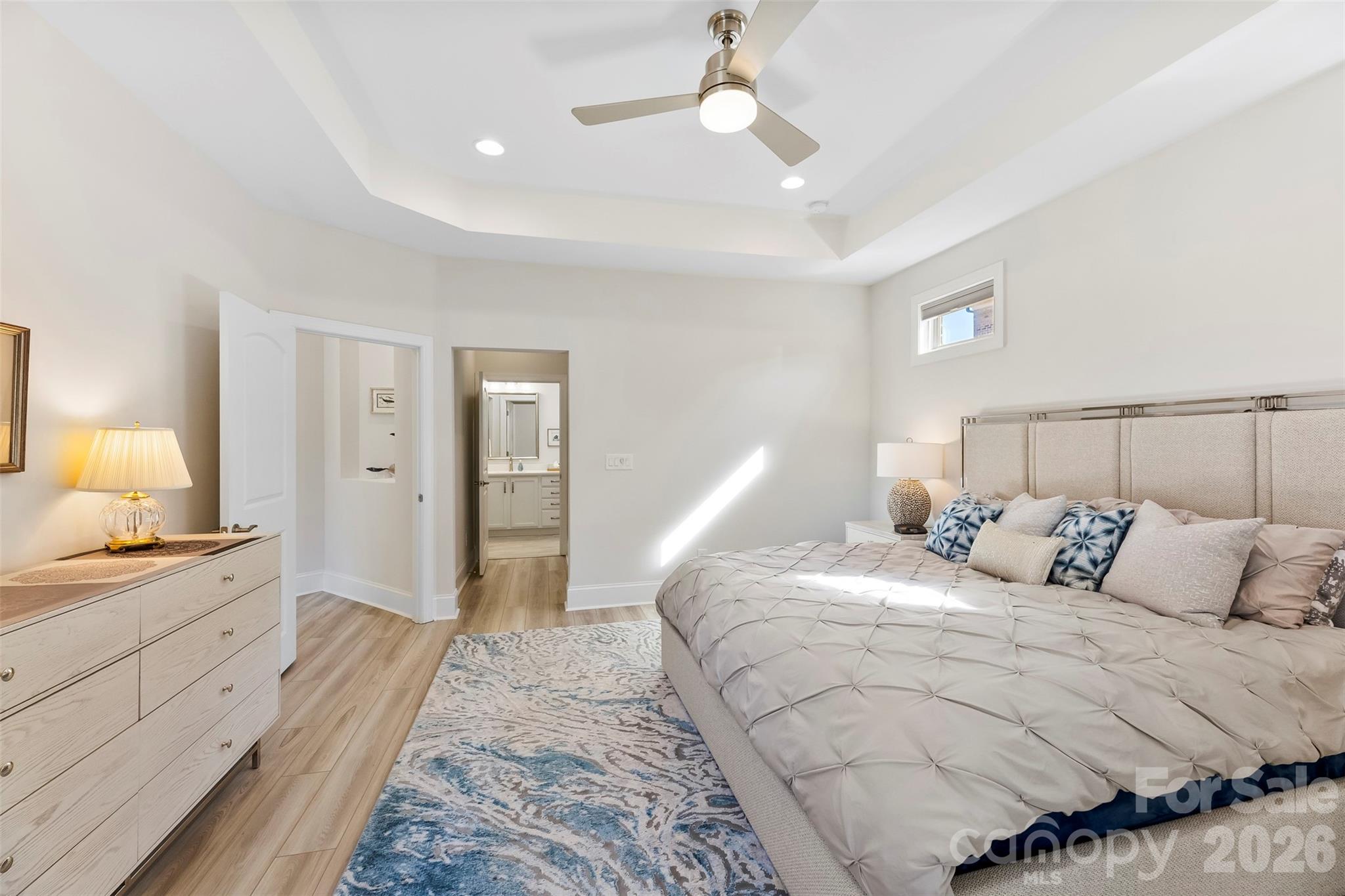 2014 New Style Way Fort Mill, SC 29708 - Photo 20 of 43 a bedroom with a bed and a chandelier