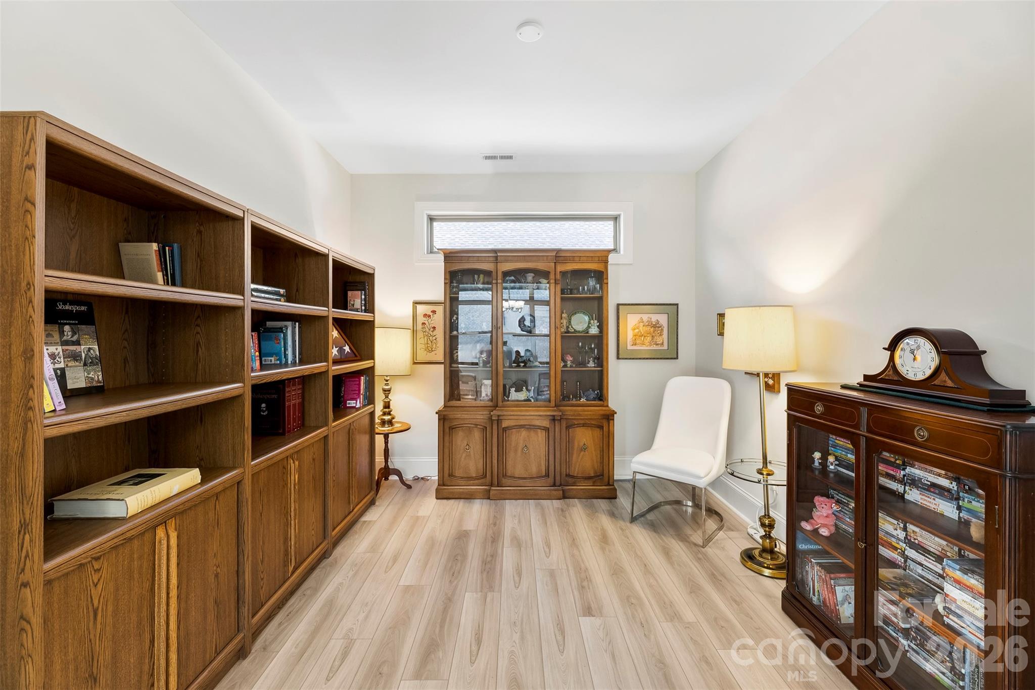 2014 New Style Way Fort Mill, SC 29708 - Photo 34 of 43 a view of a workspace with furniture and wooden floor