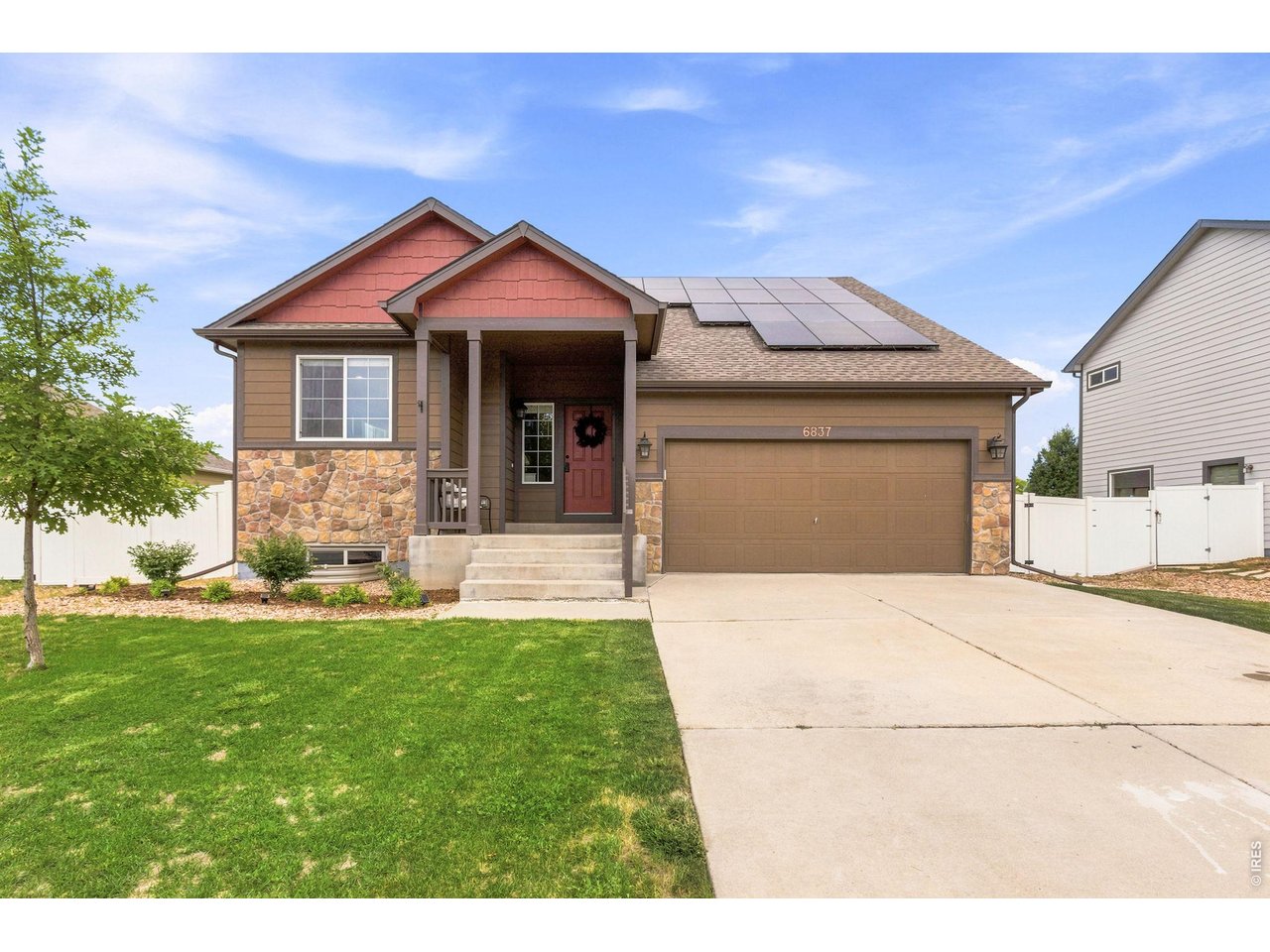 6837 McClellan Road Wellington, CO 80549 - Photo 1 of 23 Charming curb appeal, and energy-efficient solar panels help make this home as practical as it is inviting.
