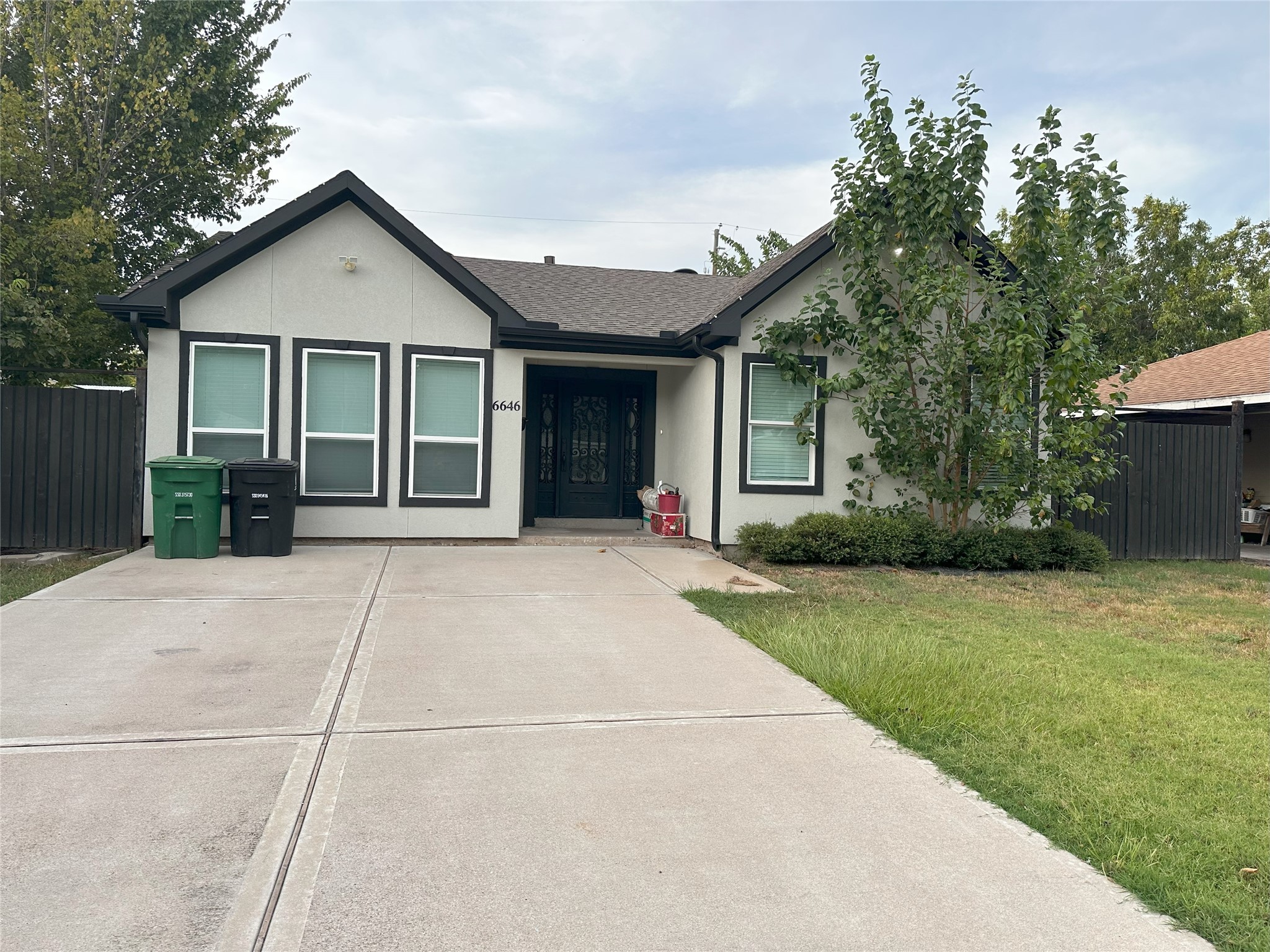 a view of a house with a garden
