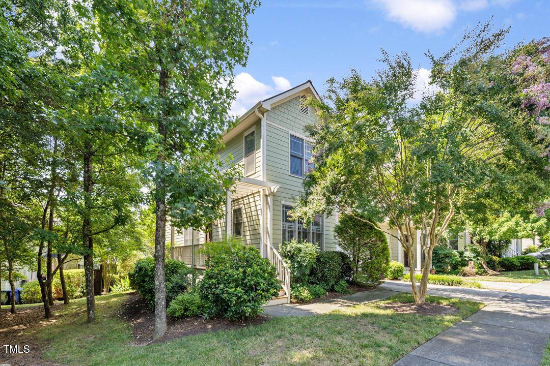 203 Bluefield Road Chapel Hill, NC 27517 - Photo 2 of 34 front view of a house with a tree