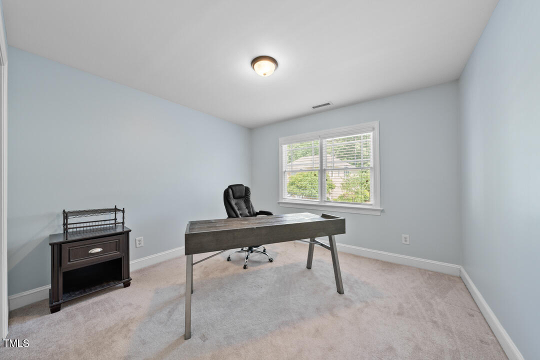 203 Bluefield Road Chapel Hill, NC 27517 - Photo 24 of 34 a work room with furniture and a window