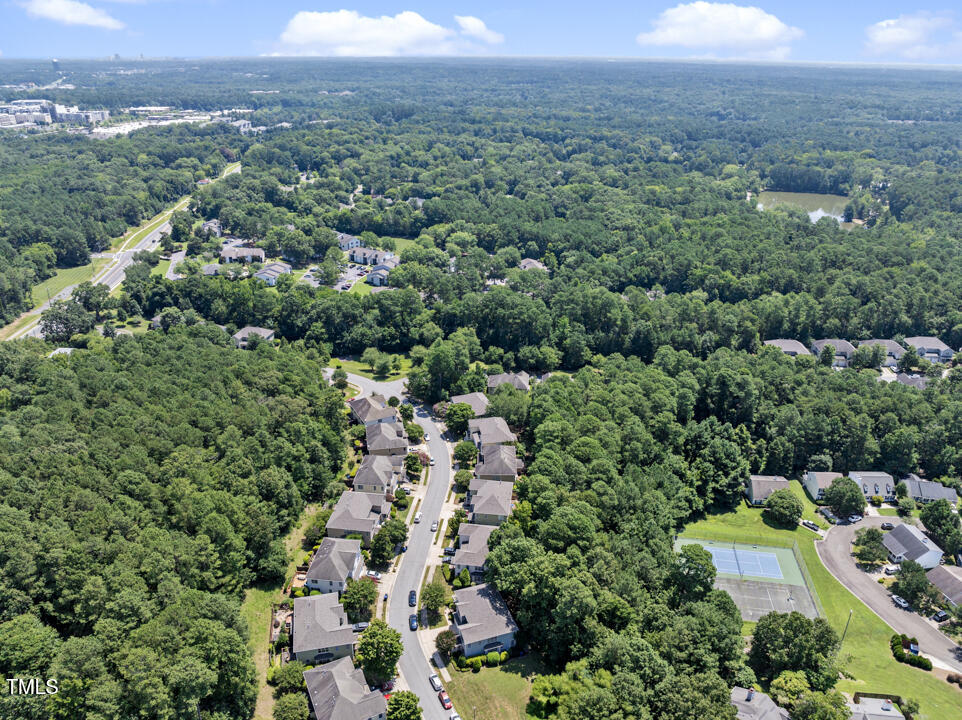 203 Bluefield Road Chapel Hill, NC 27517 - Photo 34 of 34 an aerial view of a house with a yard