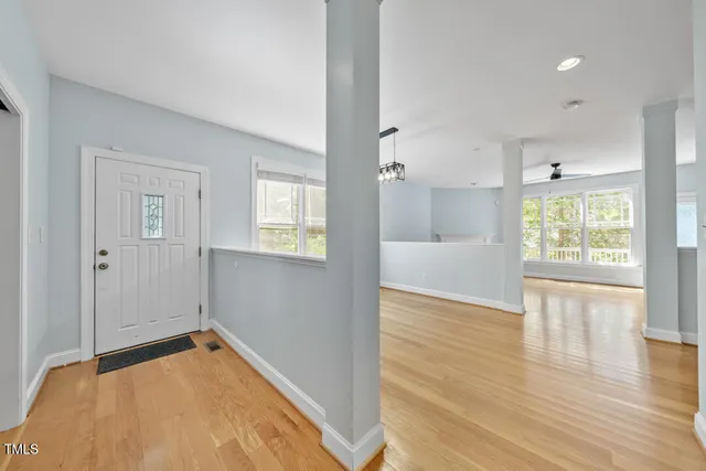 a view of an empty room and window