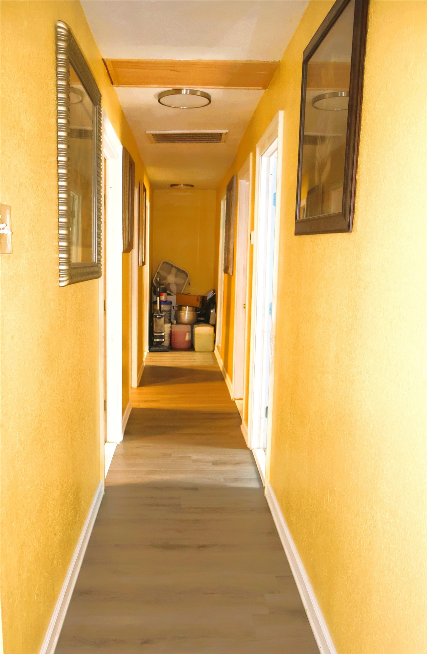 634 South Paloma Drive Rosharon, TX 77583 - Photo 14 of 14 a view of a hallway with wooden floor and a living room