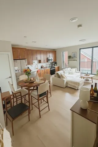 a living room with furniture and a table