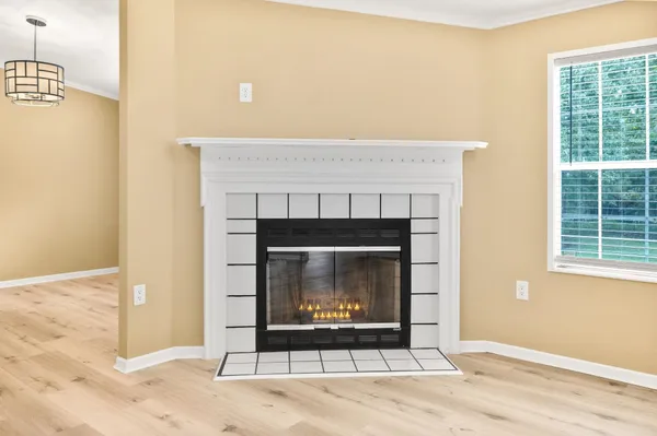 a kitchen with a sink and a refrigerator