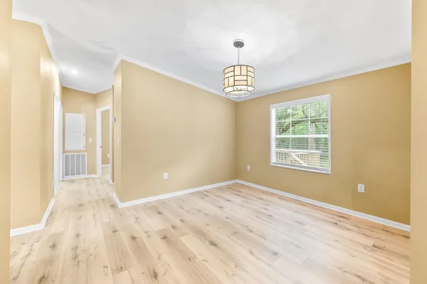 a bathroom with a toilet and shower