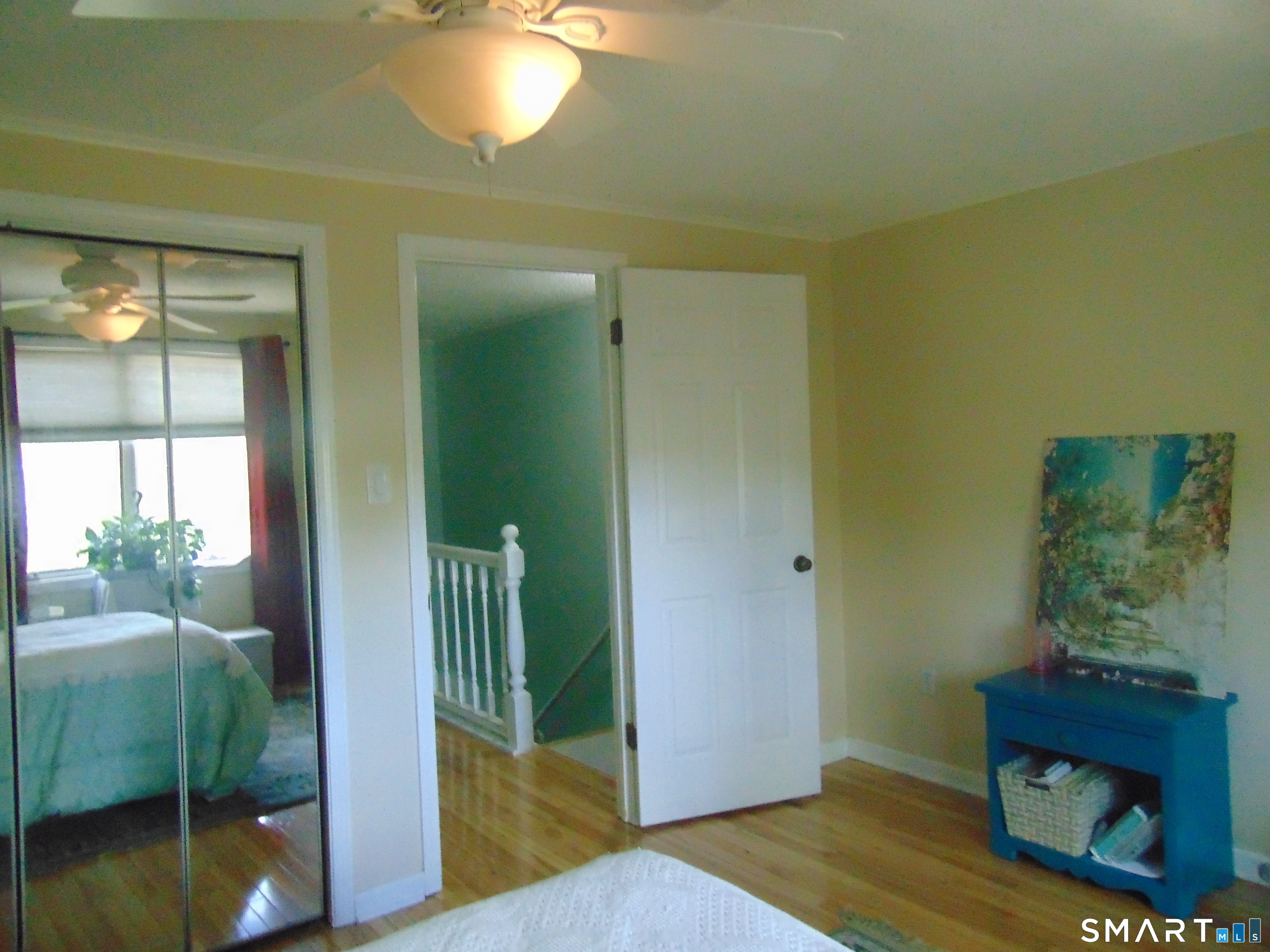882 North Colony Road, Unit 31 Meriden, CT 06450 - Photo 25 of 34 a view of a hallway to a livingroom with furniture