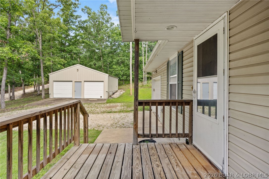 122 Hicks Drive Eldon, MO 65026 - Photo 5 of 51 View of detached shop from front deck