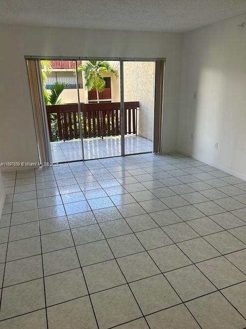 10661 Southwest 108th Avenue, Unit 2E Miami, FL 33176 - Photo 18 of 33 a view of a room with windows
