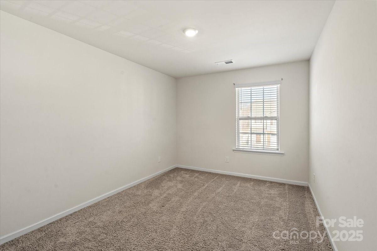 5043 Fandango Road York, SC 29745 - Photo 18 of 34 an empty room with a window