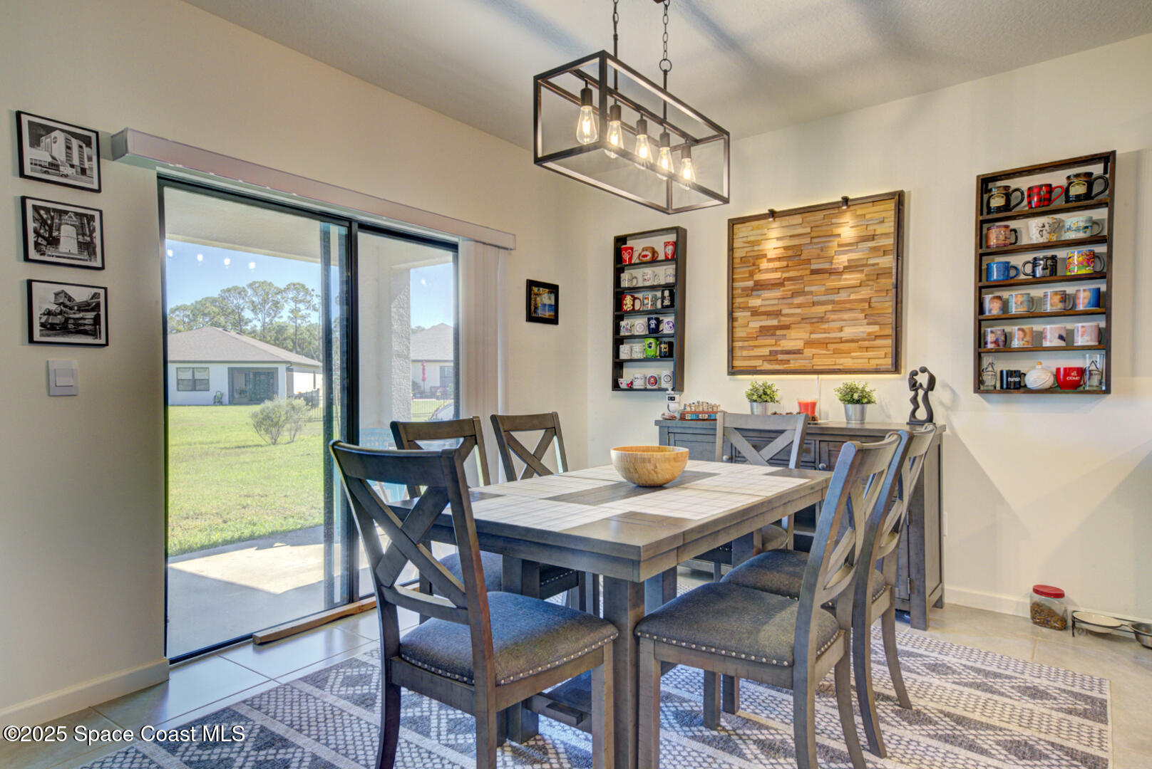 4941 Talbot Boulevard Cocoa, FL 32926 - Photo 23 of 48 a view of a dining room with furniture window and outside view