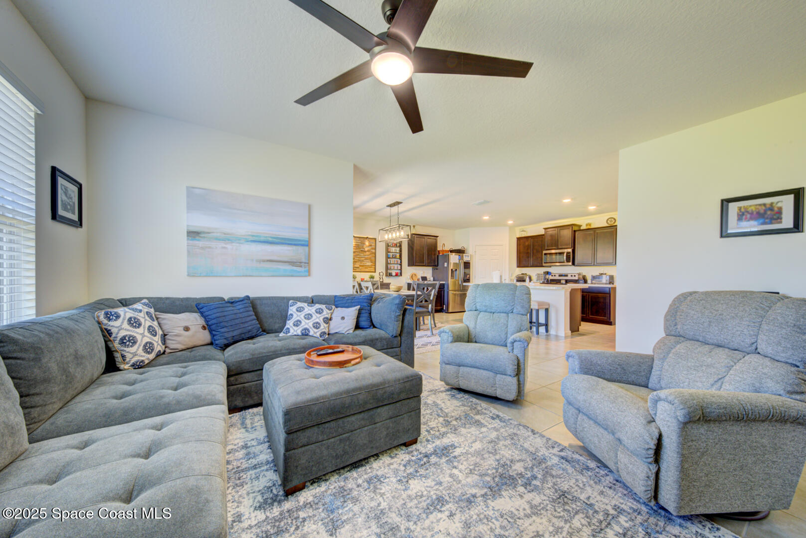 4941 Talbot Boulevard Cocoa, FL 32926 - Photo 25 of 48 a living room with furniture and a couch
