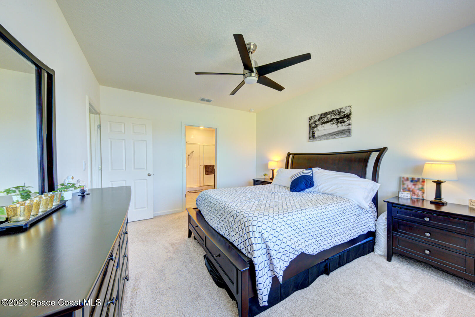 4941 Talbot Boulevard Cocoa, FL 32926 - Photo 33 of 48 a bedroom with a bed dresser and a window