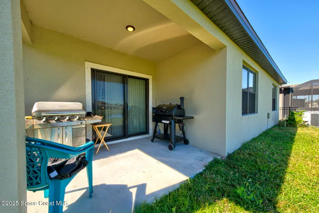 a view of backyard of a house