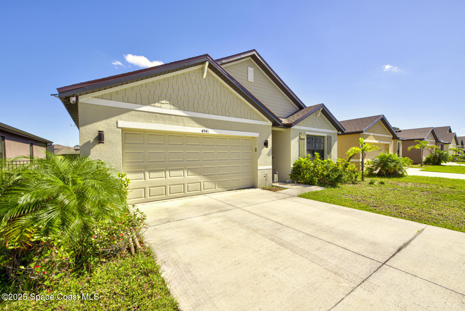 4941 Talbot Boulevard Cocoa, FL 32926 - Photo 40 of 48 a front view of a house with a yard