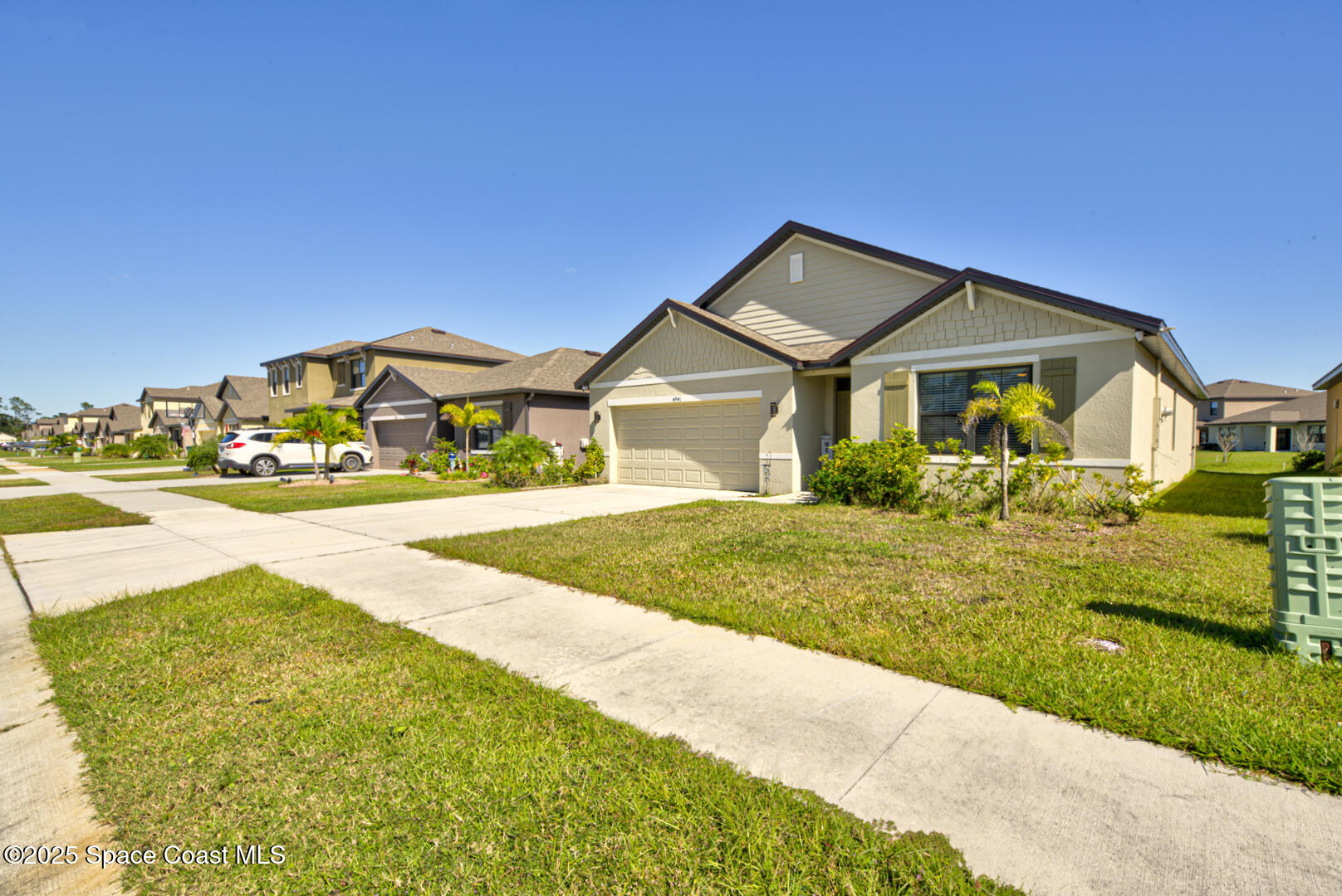 4941 Talbot Boulevard Cocoa, FL 32926 - Photo 43 of 48 a front view of a house with garden