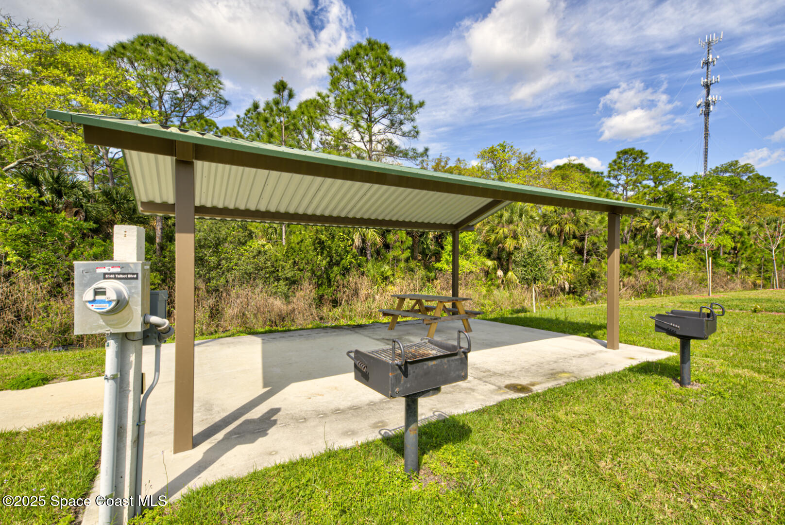 4941 Talbot Boulevard Cocoa, FL 32926 - Photo 46 of 48 a swimming pool with outdoor seating and yard