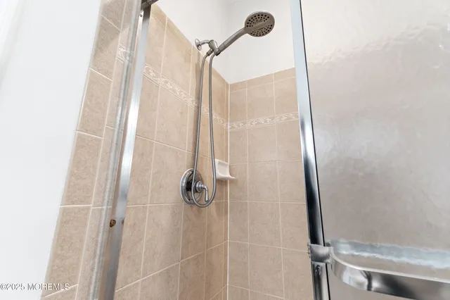 a bathroom with a bathtub and a sink