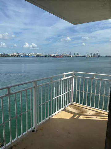 a view of lake with green space