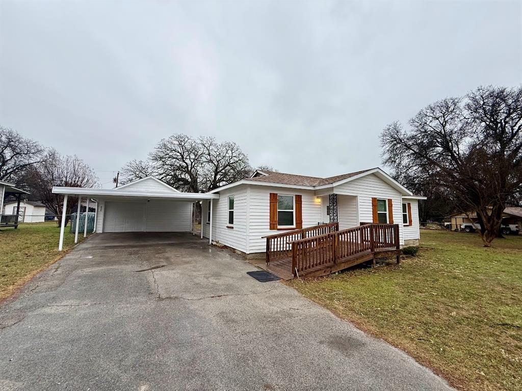 133 Gordon Drive Azle, TX 76020 - Photo 1 of 29 front view of a house with a yard