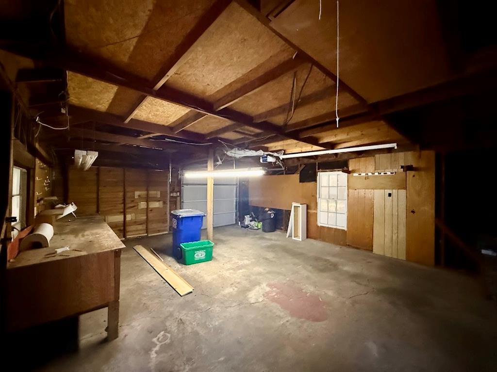 133 Gordon Drive Azle, TX 76020 - Photo 12 of 29 a view of a garage with an chairs