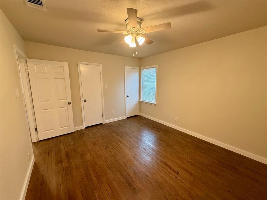 133 Gordon Drive Azle, TX 76020 - Photo 28 of 29 a view of an empty room and wooden floor