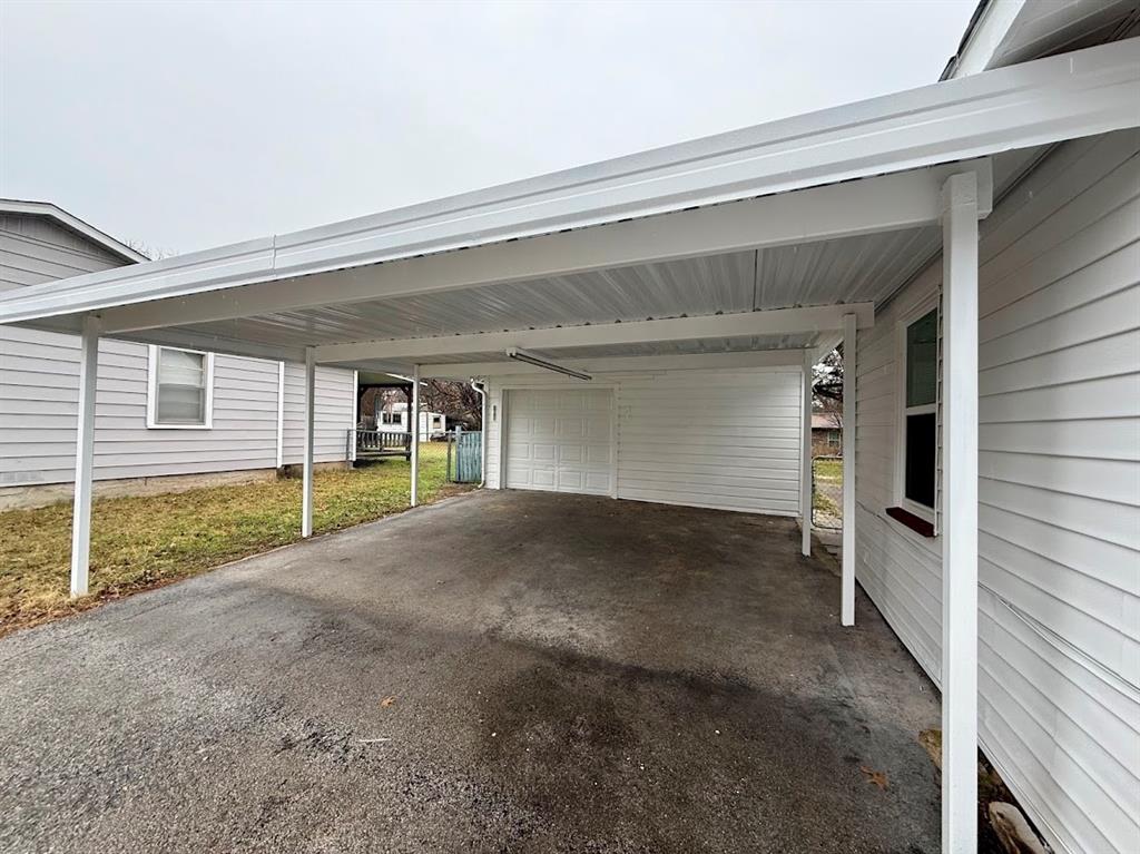 133 Gordon Drive Azle, TX 76020 - Photo 4 of 29 a view of back yard of the house