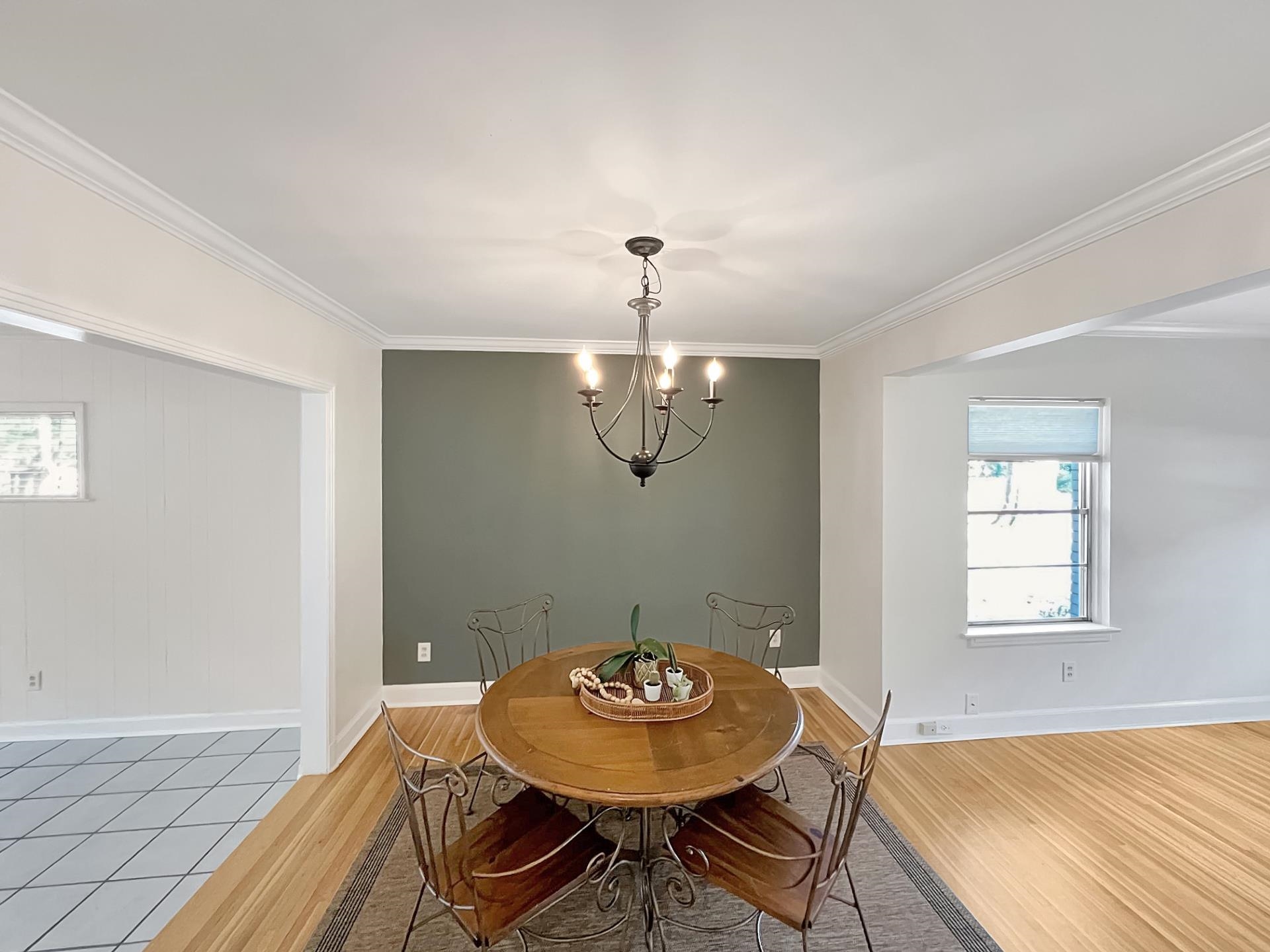 1049 South Perkins Road Memphis, TN 38117 - Photo 7 of 23 a view of a dining room with furniture and wooden floor