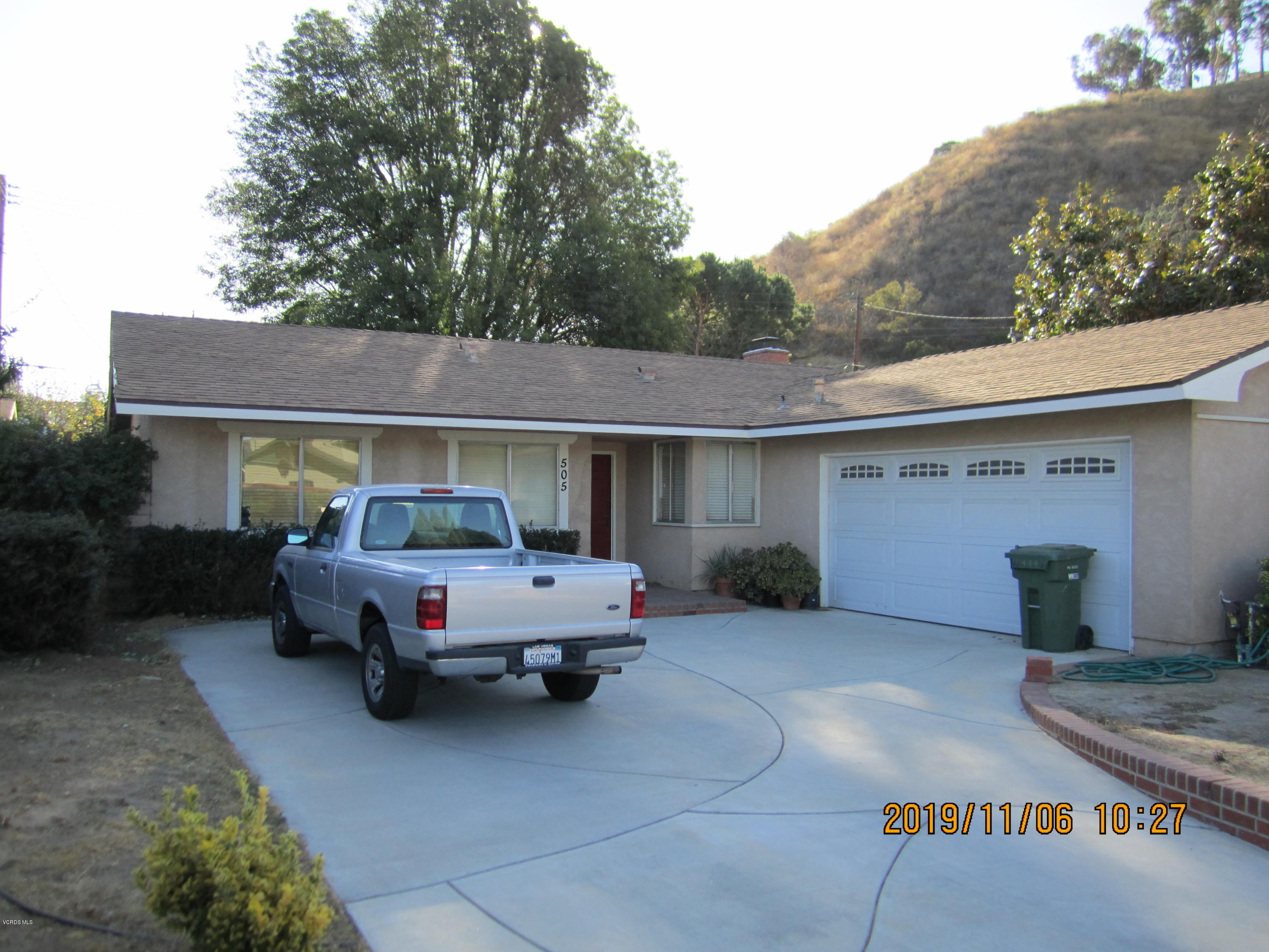 a car parked in front of house